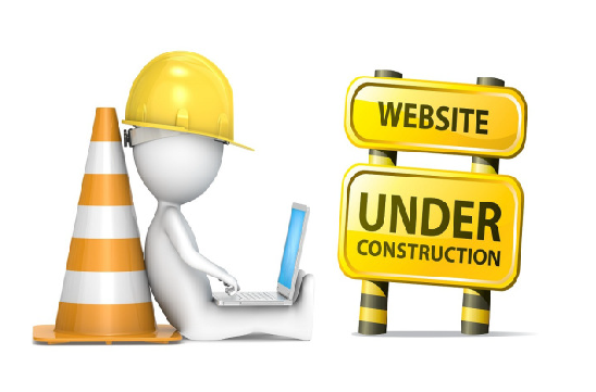 ภาพคนงานและป้ายเว็บไซต์กำลังปรับปรุง